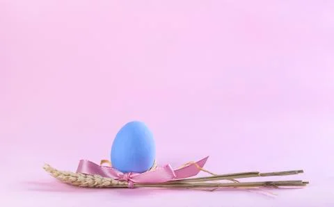 Easter blue painted egg with sheaf of wheat greeting card Stock Photos