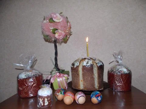 Easter bread and eggs on the table Stock Photos