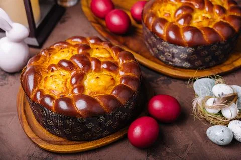 Easter bread and eggs on wood Stock Photos