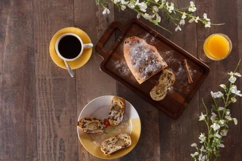 Easter breakfast with raisin bread, orange juice and coffee Stock Photos