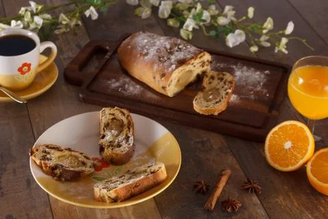 Easter breakfast with raisin bread, orange juice and coffee Stock Photos