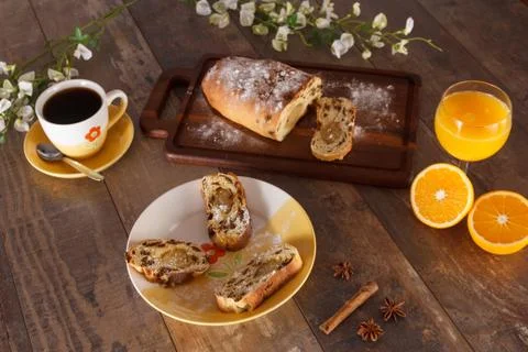 Easter breakfast with raisin bread, orange juice and coffee Stock Photos