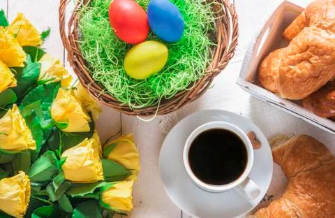 Easter breakfast table and roses bouquet Stock Photos