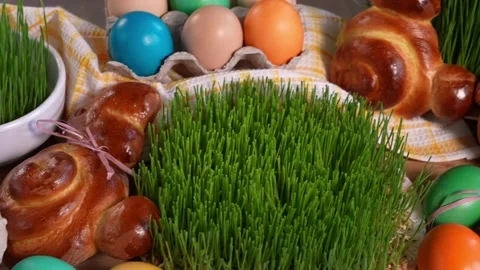 Easter bunnies, Easter eggs, microgreens on the table Stock Footage 169571181