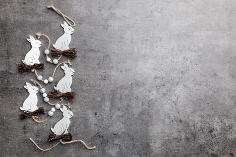 Easter bunnies on a grey rustic background Stock Photos