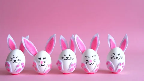 Easter bunnies made from eggs on the pink background Stock Footage 149819258