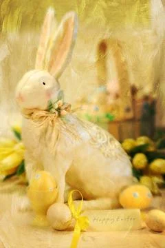 Easter bunny and eggs with a painterly effect Photos