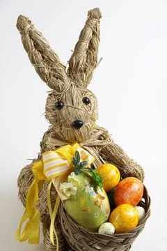 Easter bunny with a basket full of Easter eggs Stock Photos
