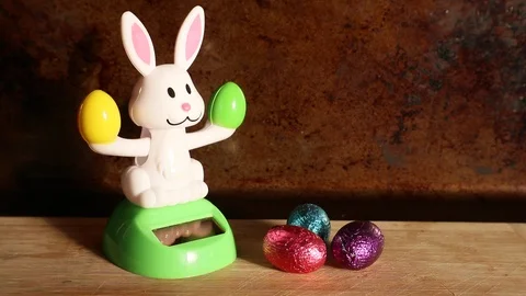 Easter Bunny Dancing Delivers Chocolate Eggs Stock Footage 126787120