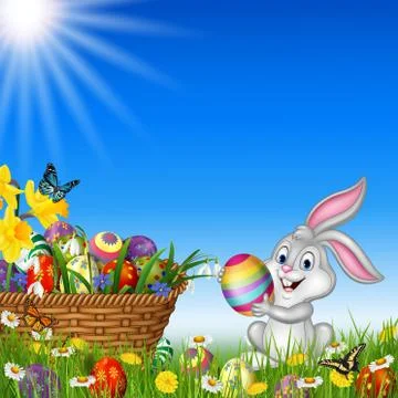 Easter bunny with decorated Easter eggs in a field Stock Illustration