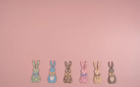 Easter Bunny  on different colours on Pink Background with Copy Space Stock Photos