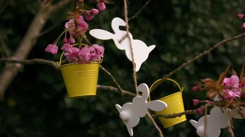 Easter bunny ears and easter decorations on blossom tree Stockbeeldmateriaal 337565639