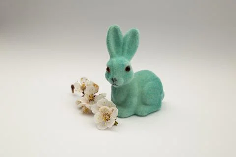 Easter Bunny by the Easter Eggs on a white background Stock Photos