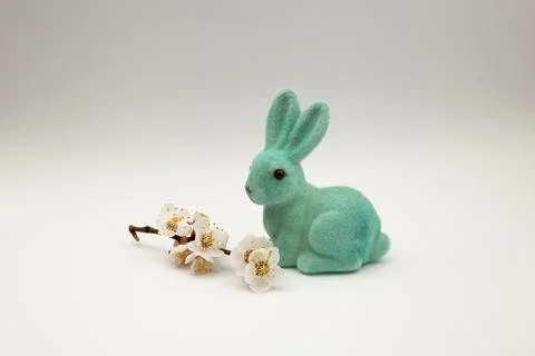 Easter Bunny by the Easter Eggs on a white background Stock Photos