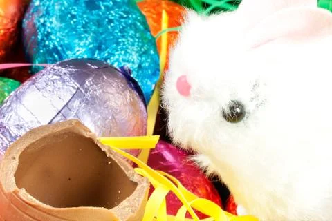 Easter bunny eats egg Stock Photos