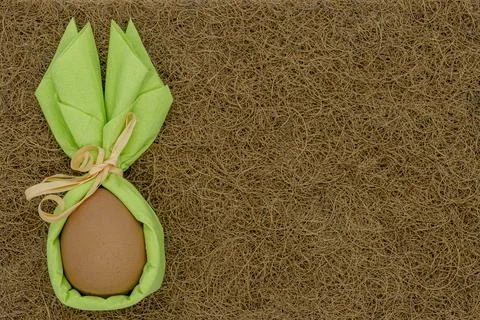 Easter bunny egg on grass texture close-up Stock Photos