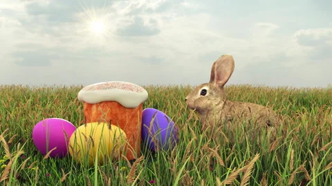 Easter Bunny near eggs and Easter bread on the lawn. Stock Footage 175366006