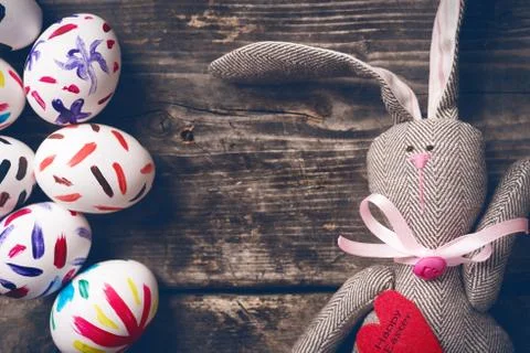 Easter bunny on old boards. Stock Photos