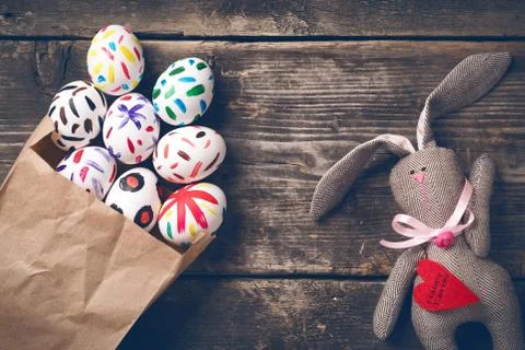 Easter bunny on old boards. Stock Photos