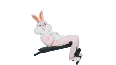Easter Bunny or rabbit funny sportsman athlete bodybuilder is practicing trains Видео 146711872