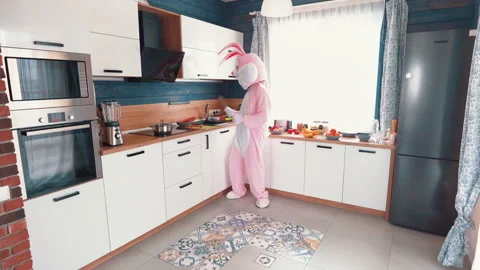 Easter Bunny or rabbit preparing for celebrate Happy easter. Man in adult giant Vidéo 145690070
