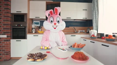 Easter Bunny or rabbit preparing for celebrate Happy easter. Man in adult giant Видео 145692063