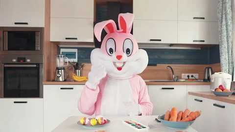 Easter Bunny or rabbit preparing for celebrate Happy easter. Man in adult giant Video stock 146025182