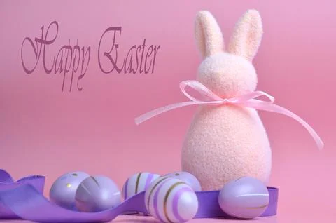 Easter bunny on a pink background. Stock Photos