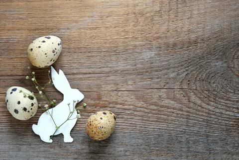 Easter bunny with quail eggs Stock Photos
