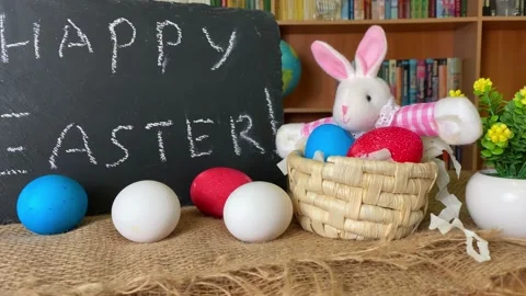 Easter bunny rabbit with colored eggs Stock Footage 171208002