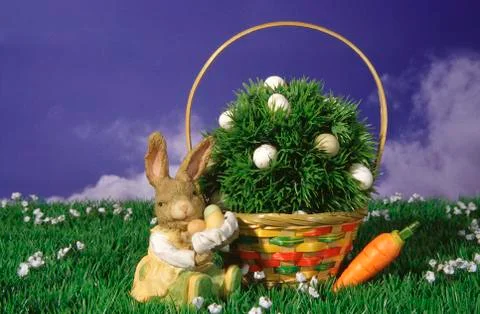 Easter bunny sits front scrub eggs rabbit egg Stock Photos