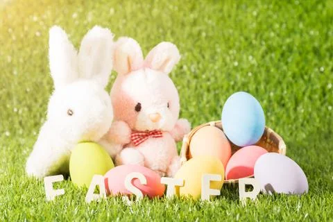 Easter bunny toy and Easter egg Stock Photos