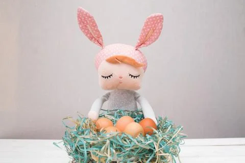 Easter bunny toy with eggs as Easter concept Stock Photos