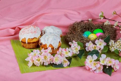 Easter cake and colored eggs Stock Photos