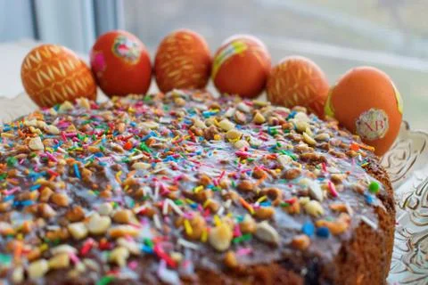 Easter cake and colored eggs with colorful decoration on holyday Stock Photos