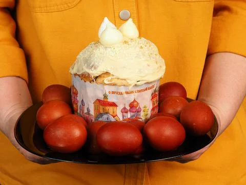 Easter cake and colored eggs. Festive food. Stock Photos