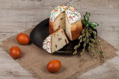 Easter cake and colored eggs Stock Photos