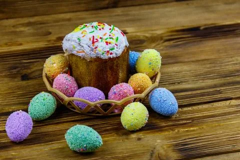 Easter cake and easter eggs on a wooden table 写真素材