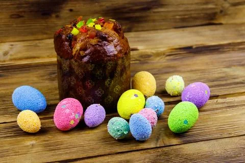 Easter cake and easter eggs on a wooden table 写真素材