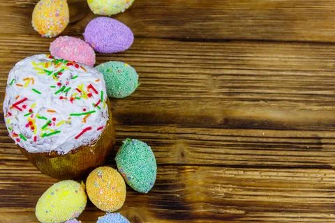 Easter cake and easter eggs on a wooden table. Top view, copy space 写真素材