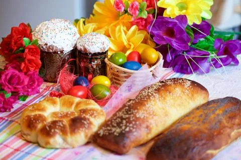 Easter cake and painted eggs Stock Photos