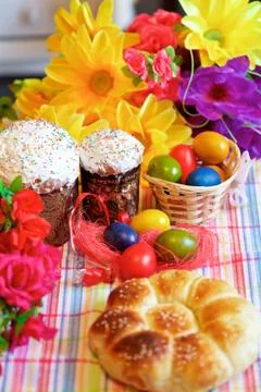 Easter cake and painted eggs Stock Photos