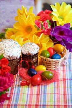Easter cake and painted eggs Stock Photos