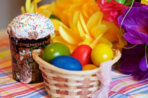 Easter cake and painted eggs Stock Photos