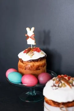 Easter cake and painted eggs. Easter composition with orthodox sweet bread, k Stock Photos