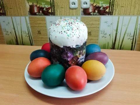 Easter cake and painted eggs. Stock Photos