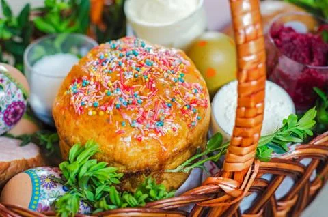Easter cake in basket Stock Photos