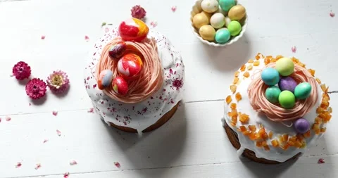 Easter cake with chocolate eggs decoration, on white wooden table 動画素材 173006063