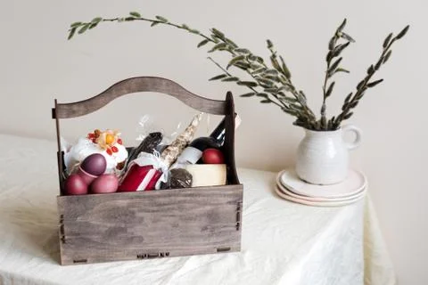 Easter cake, colored eggs, meat and bottle of red wine. Orthodox sweet bread, Stock Photos