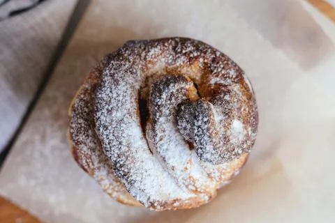 Easter cake cruffin on a gray background. Stock Photos